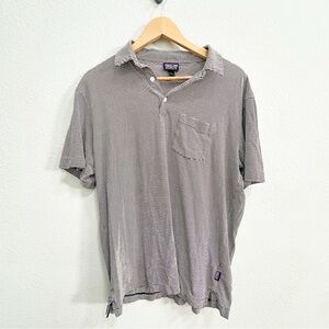 Patagonia Men's black and white Striped Shirt with front pocket and buttons